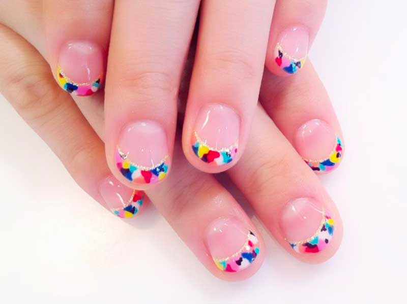 Multicolored Printed Tips French Manicure