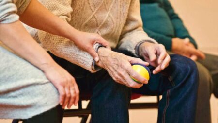 a close-up of a hand holding a ball