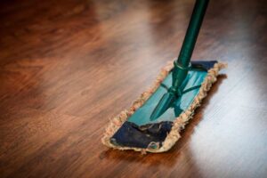 a mop on a wooden floor
