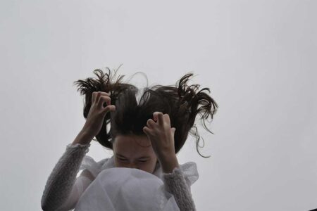 Why Your Hair Is Falling Out (And What To Do About It)